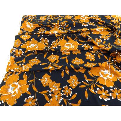 Tissu Jersey Fleurs Noir / Moutarde